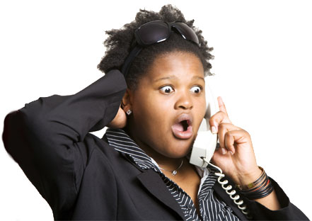 Surprised Woman on the phone with sunglasses.